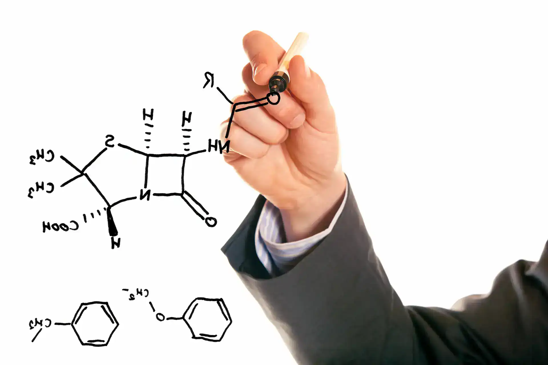 Science Sketches A hand drawing science sketches in black dry erase marker.