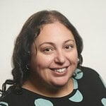 Professional business consultant smiling, promoting corporate growth and strategic solutions.