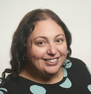 Professional business consultant smiling, promoting corporate growth and strategic solutions.