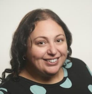 Professional business consultant smiling, promoting corporate growth and strategic solutions.