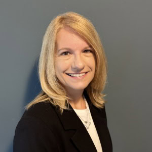 Experienced business professional smiling for corporate photo at CTLG Consulting.