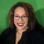 Professional woman smiling, business profile photo, CTLG consulting firm branding.