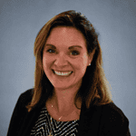 Professional female business consultant smiling in workplace portrait.