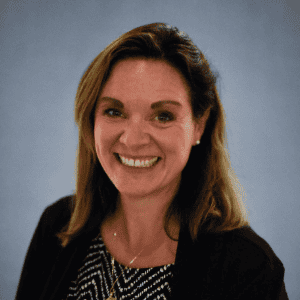 Professional female business consultant smiling in workplace portrait.