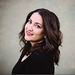 Professional woman smiling, corporate headshot, business, confident, female executive.