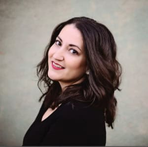 Professional woman smiling, corporate headshot, business, confident, female executive.