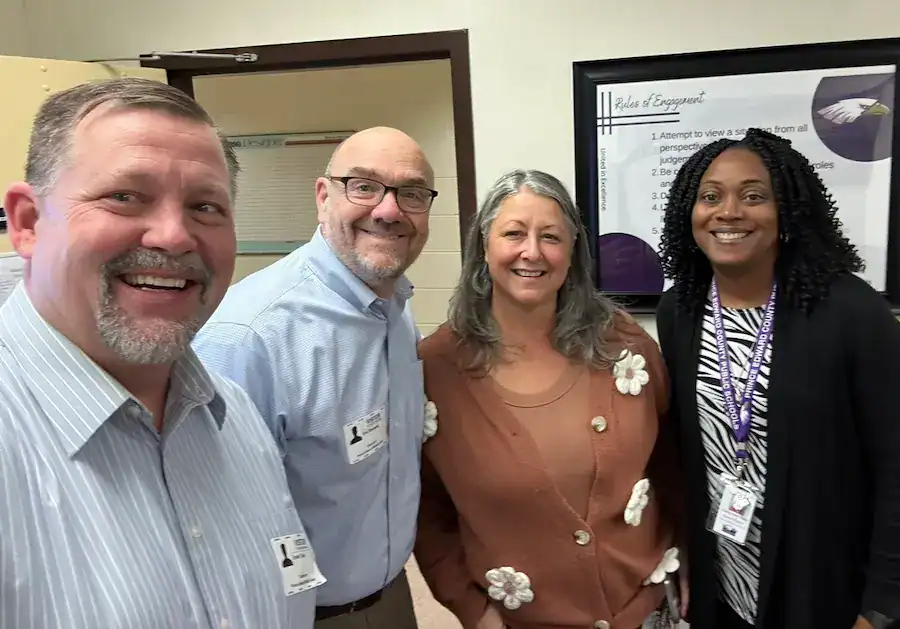 Empowered business professionals at CTLG consulting event.